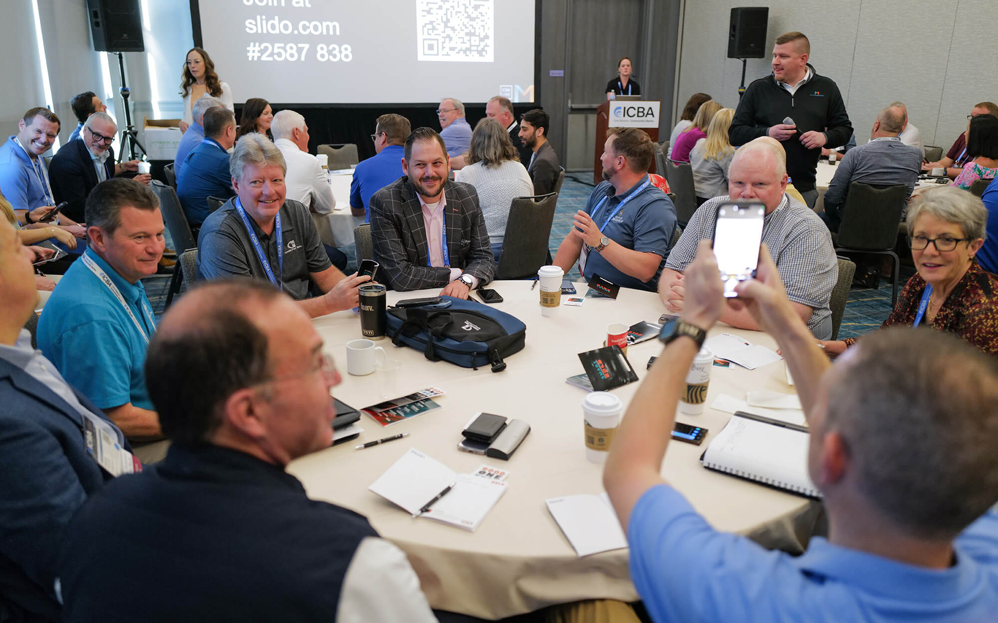 ICBA LIVE Attendees in crowd at table